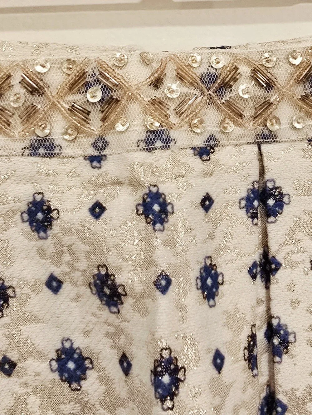 Miami Cream Brocade Shimmery Skirt with Blue Floral Print And Beaded Waist.